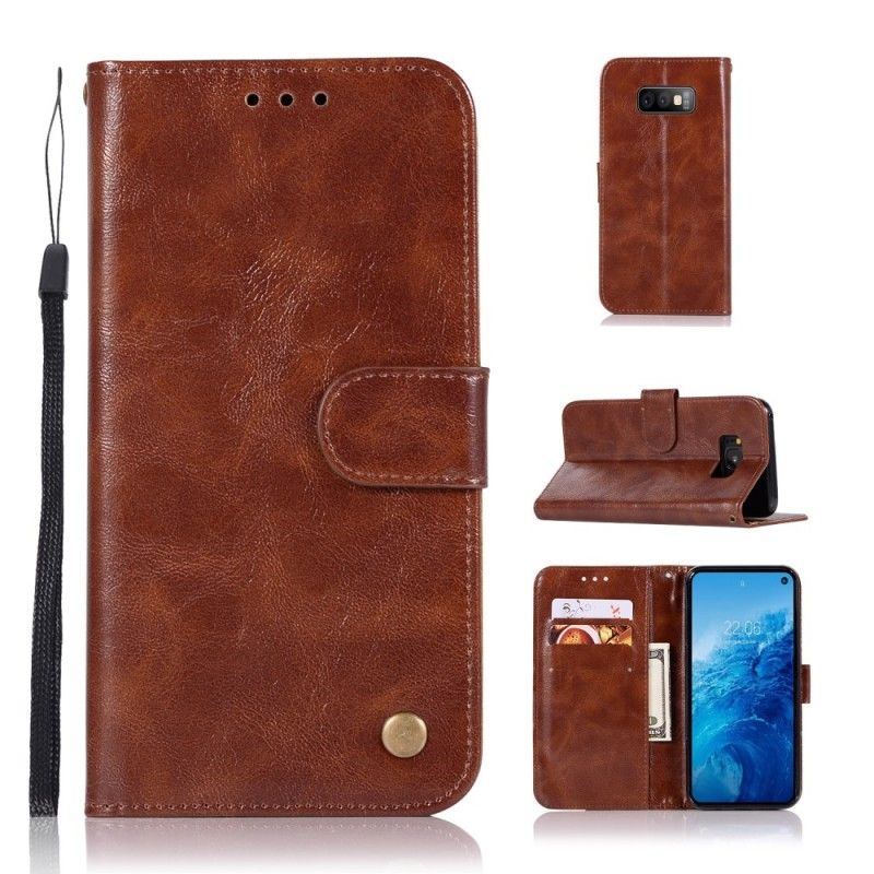 Folio Deksel Samsung Galaxy S10e Vintage Skinneffekt Med Stropp